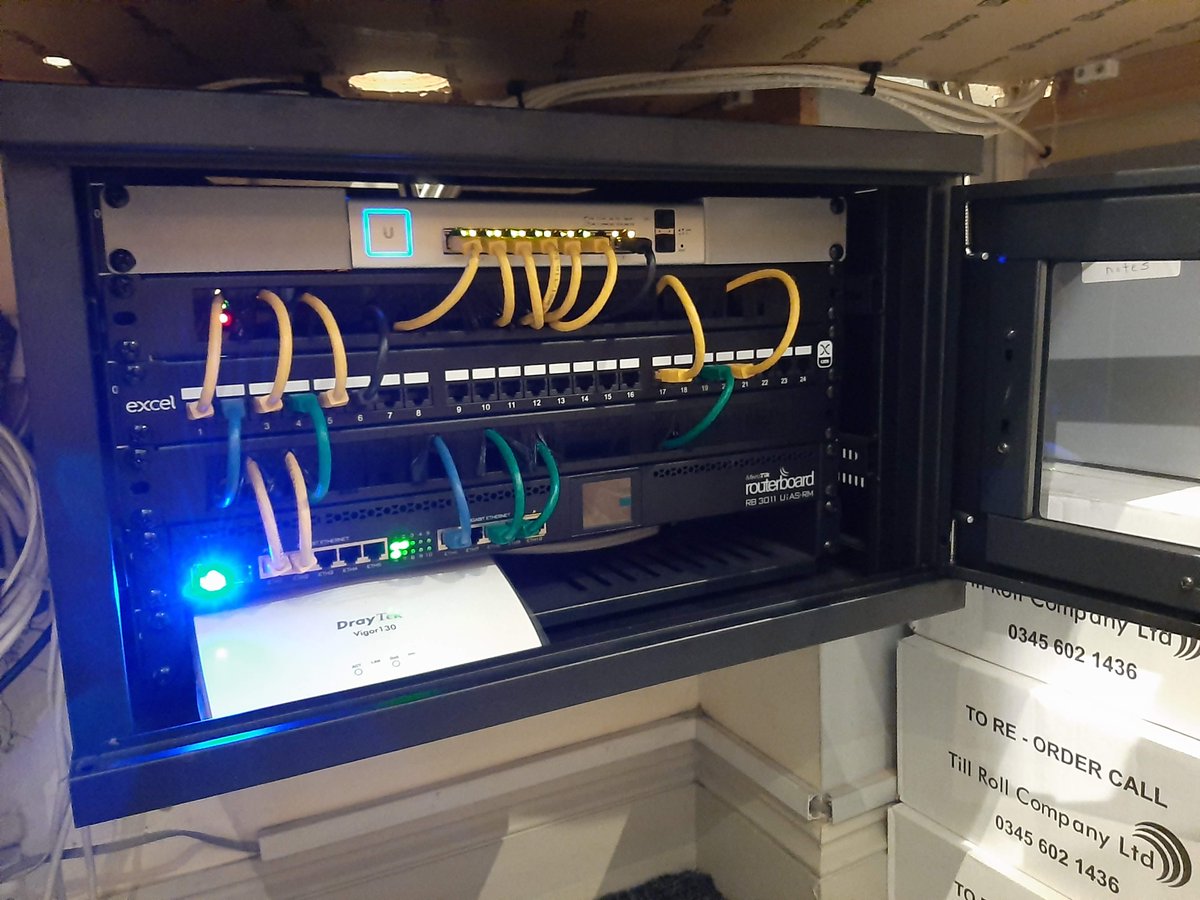 SirrahTech's tweet image. Before and after pictures from a recent hotel network upgrade and tidy-up. Installed new rack, MikroTik router, and Unifi PoE switch to power multiple new WiFi access points for new Guest WiFi Network. #Network #WiFi #NorthEastWiFi #Unifi
