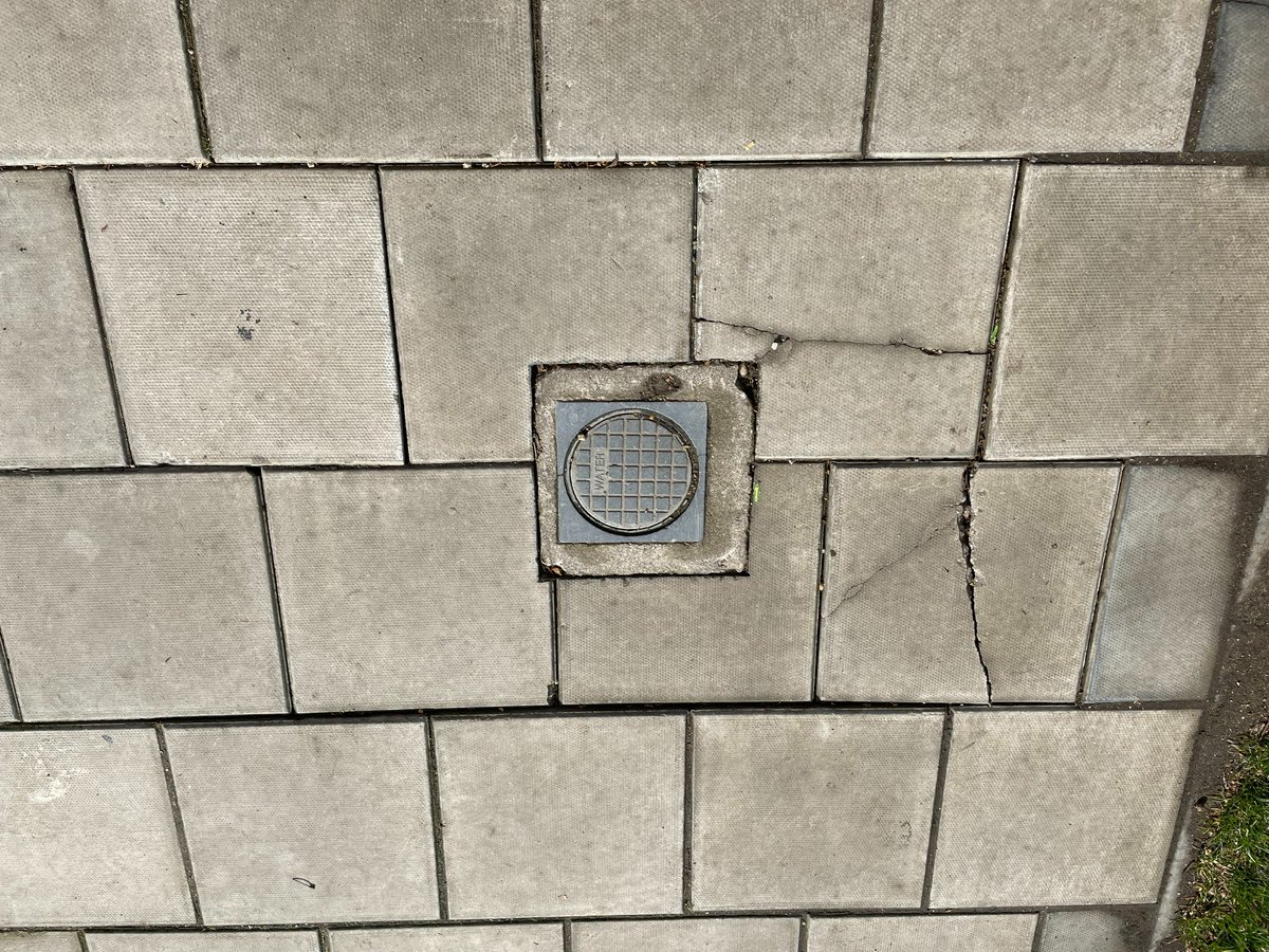Waller4Labour's tweet photo. A section of the pavement around the Thames Water access cover outside 150 Boston Manor Rd, Brentford has sunk and cracked following recent work. Can @thameswater @LBofHounslow @GuyLambert @LaraCParizotto sort it out before someone trips up https://t.co/jrJhloOyfP