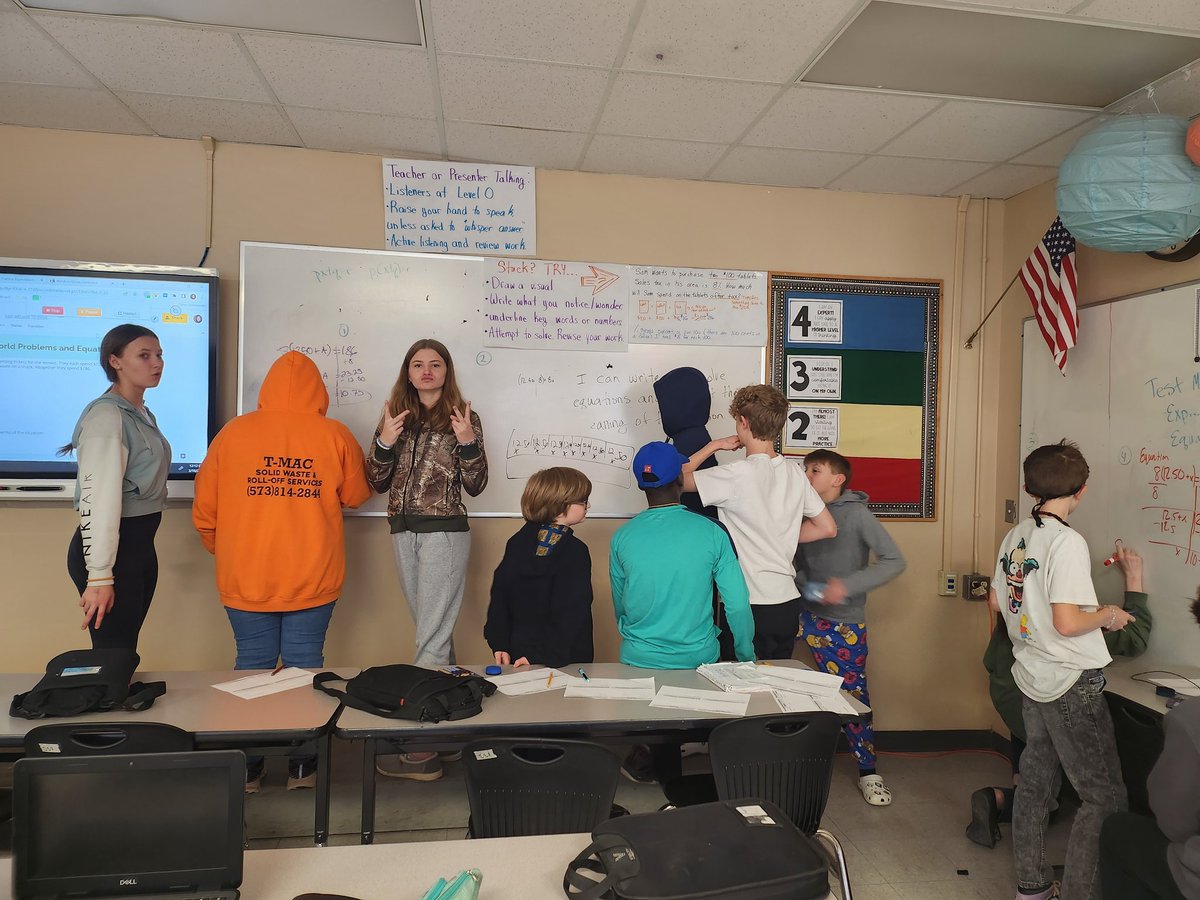 Barkersmath's tweet photo. Non-permanent vertical surfaces to solve story problems by writing and solving equations. Some groups drew a picture or tape diagram first. #fmsteach https://t.co/jpox4dphTz