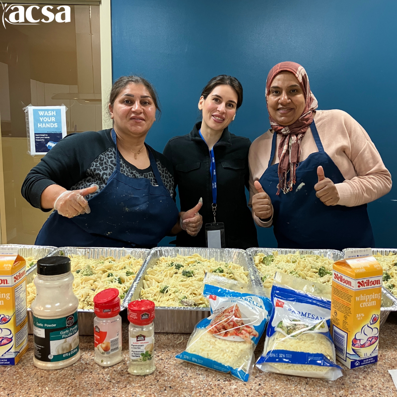 ACSAtoronto's tweet photo. The ladies behind our Cook to Connect program prepared 5 trays of Alfredo pasta &amp; served about 100 community residents just this Tues. This is how we empower community members like Marwha &amp; Bahia to be strong leaders. Show your support &amp; donate today Link in Bio 💙 https://t.co/3aLtq1LfUB