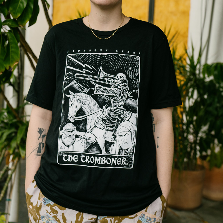 HolyWowStudios's tweet photo. Excited to announce these stylish THE TROMBONER t-shirts will be available Monday from @iam8bit, with art by @GoranGligovic! 💀🎺🎉 https://t.co/wyXOtZ8x4J