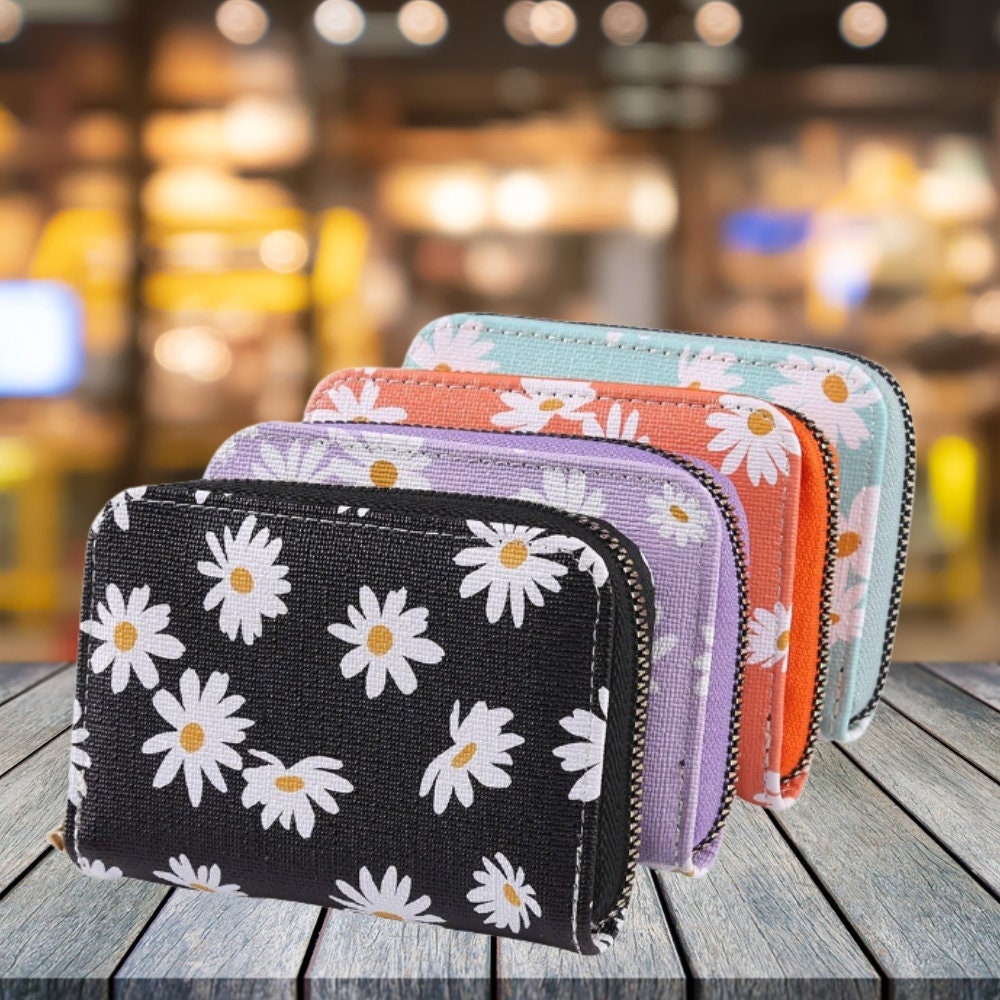designsbycay's tweet photo. 🌼#ZipperWallet for Women, #FlowerWallets, #Daisy Floral #Cute Girls #CardHolders, Colorful #TravelWallet Purses https://t.co/BSvWKPCvbA #birthdaygift #eastergift #cutewallets #artdeco #smallwallet #womenswallets #zipperclosure #floralwallet #whiteflowers https://t.co/wZhMznhn8X