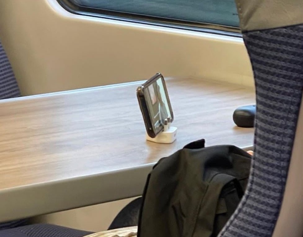 E_Crowe10's tweet photo. Using the plug as a phone stand! This woman is living in 3023 https://t.co/2J2JmGvSjG
