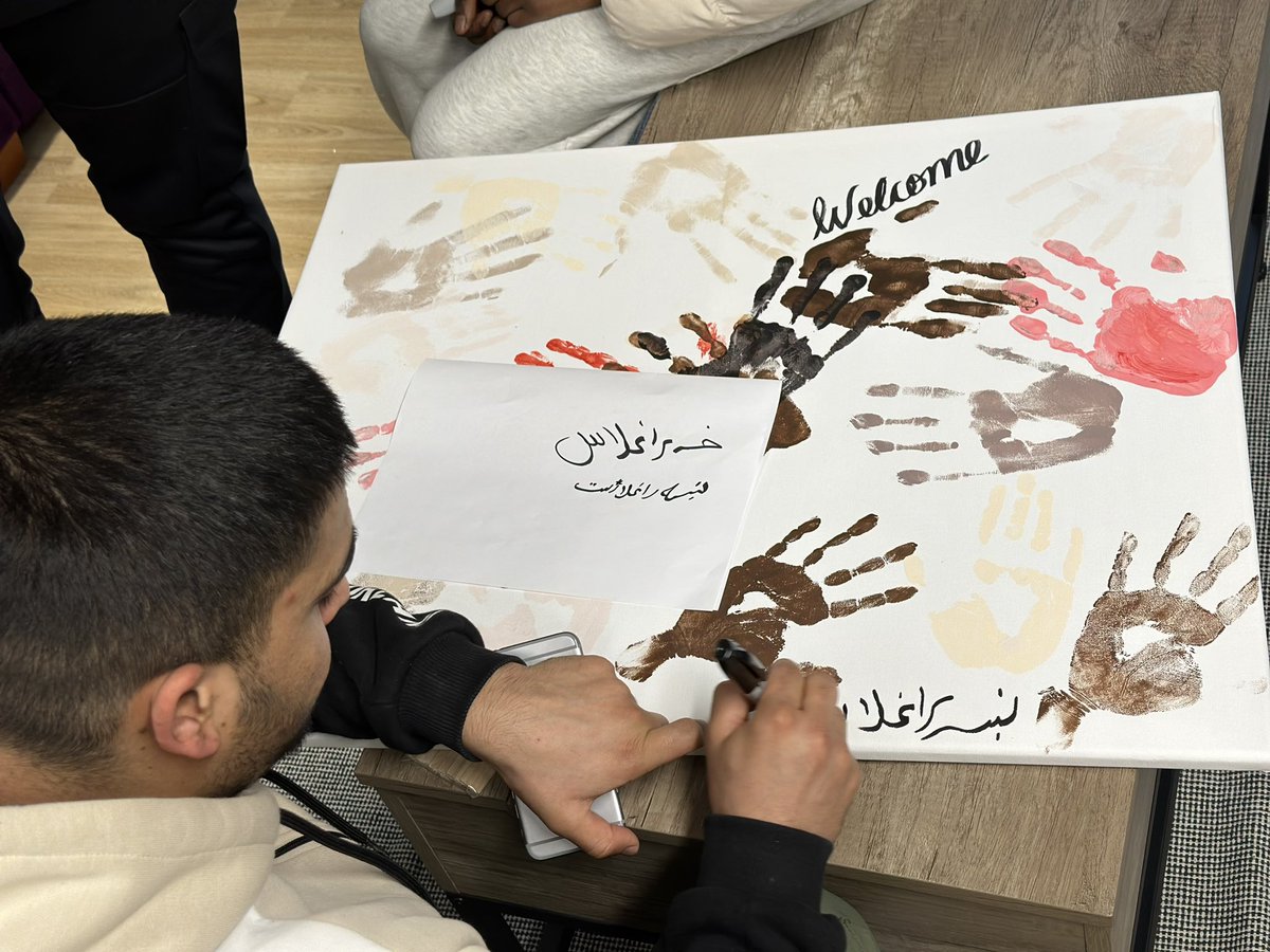 An amazing Click Together session finishing off our welcome sign in different languages and featuring their handprints to signify diversity #clickfam