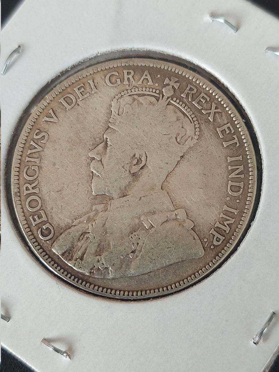 McCormark's tweet image. Canadian 50 cents from 1919. World War 1 ended in June of that year with the signing of the Treaty of Versailles