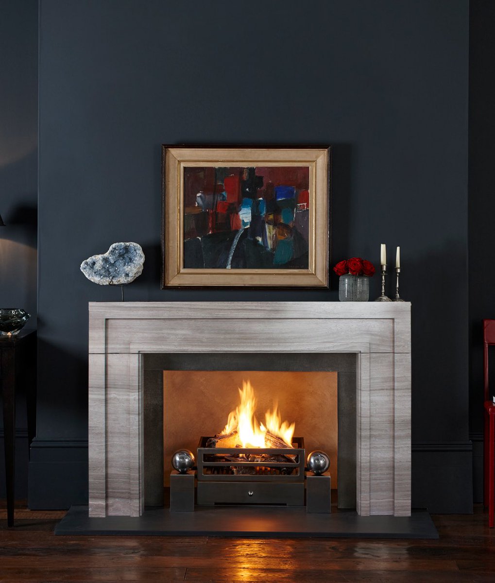 The Manhattan fireplace surround crafted in Driftwood from our Special Materials collection.  Our Soho fire basket and Spherical Steel fire dogs complement this contemporary design. 
 
Visit the Chesneys website or contact our showrooms for more information.
 
#fireplace #mantle