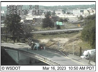 MyEverettNews's tweet photo. There's a semi hanging on overpass from SR 2 to I-5. https://t.co/EEGaU5PiXW