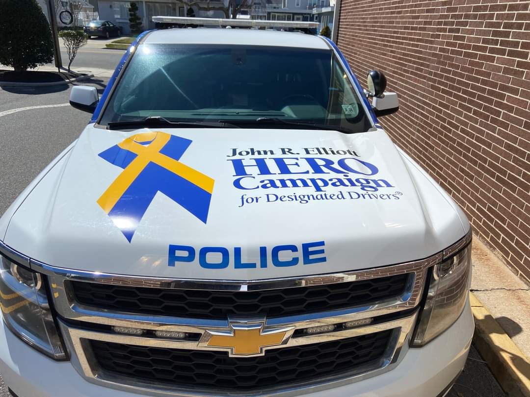 NorthWildwoodPD's tweet photo. We are excited to unveil the latest HERO police cruiser in North Wildwood! These patrol vehicles have been wrapped with the HERO Campaign logo and the life-saving slogan, “Be a HERO. Be a Designated Driver.”  #BeAHERO, #BeADesignatedDriver, #NJDHTS https://t.co/eVnbuPxZQY