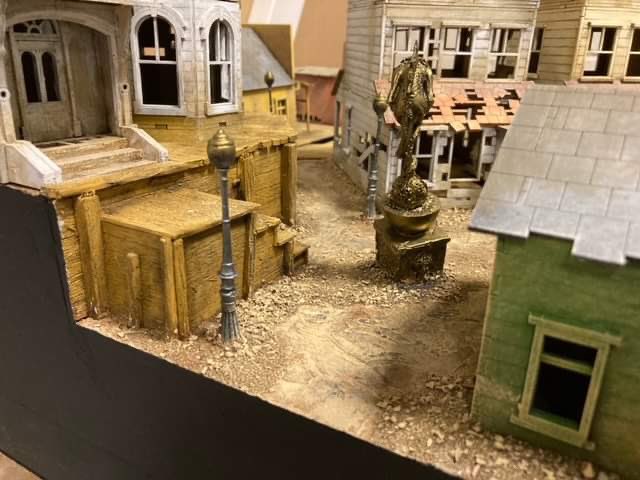 DiceCrooked's tweet photo. David at TM Terrain has nearly finished our Salute board for a quick play game of Lurkers of the Deep - downtown Marshport has never looked so good!
https://t.co/lVtYNHONBF
#lurkersfromthedeep #crookeddice #wargaming #7tvpulp #skirmishgames #sarissa #salute50 https://t.co/3NMty0ispt