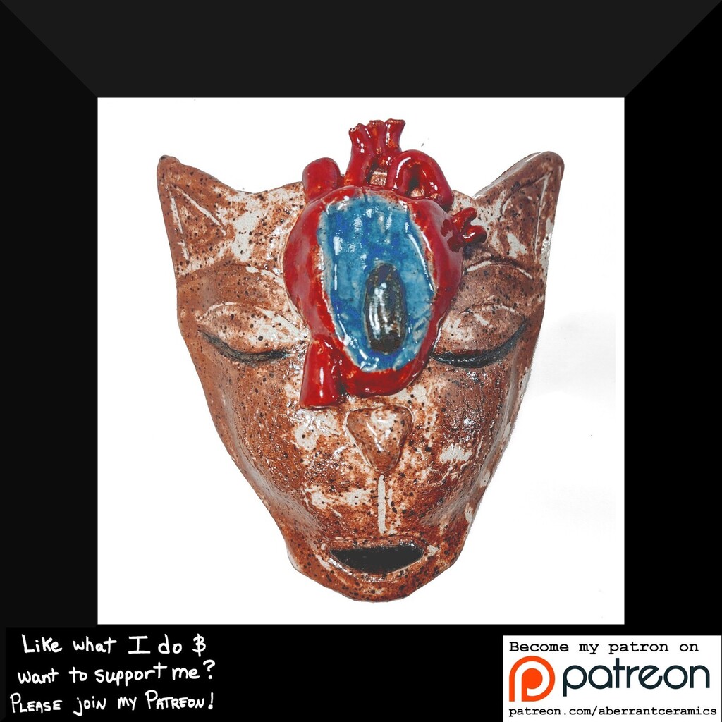 Third Eye Cat Wall Mask with Heart Organ.
Available in my Etsy shop.
See link in bio.

#catsofinstagram #anatomicalheart #heart #ceramicsofinstagram #ceramicartist #ceramicart #wallmask #wallhanging #ceramicmask #ceramiccreatures #tucsonartist #aberrantceramics #neurodiverge…