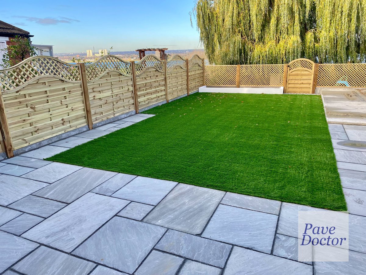 PaveDoctor's tweet photo. A lovely view across the reservoir from this garden. We used natural grey Indian sandstone slabs, new Neris fence panels, artificial grass and a concrete base ready for a new summer house/ office room to be installed.

#PaveDoctor
#chingford
#patio
#slabs
#indiansandstone https://t.co/tmFsYYmsig