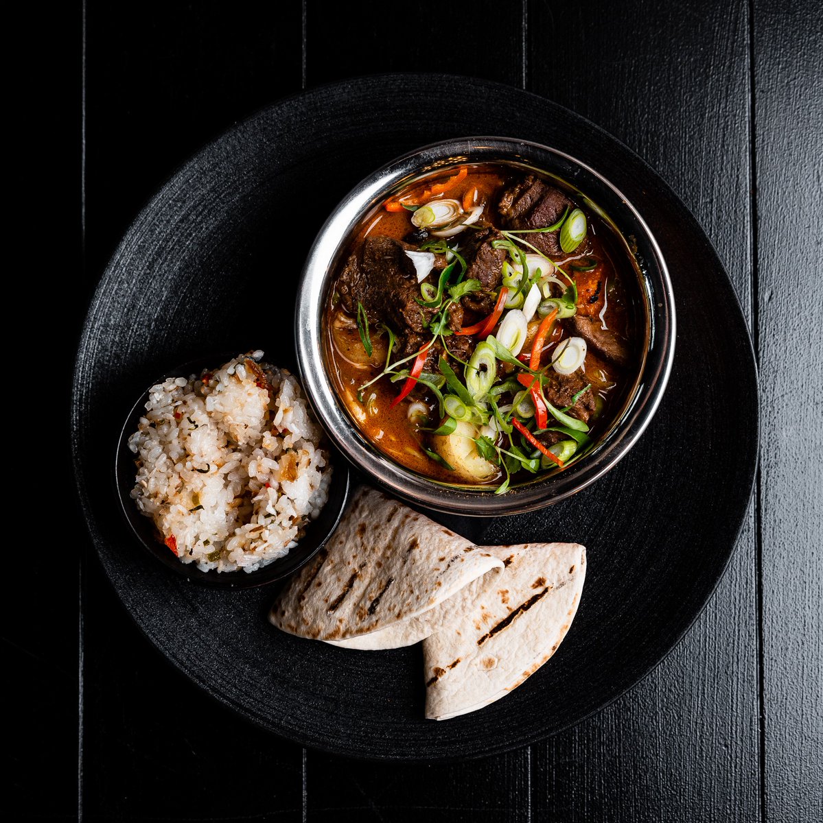 LeedsPacific's tweet photo. Our delicious lamb massaman curry. 

Served with our Grand Pacific forbidden rice, gunpowder potatoes and roti to provide you with a mesmeric voyage of tastes from distant shores. 

To reserve a table, follow the link in our bio.

#leedsfood https://t.co/VQX9nWNdNd