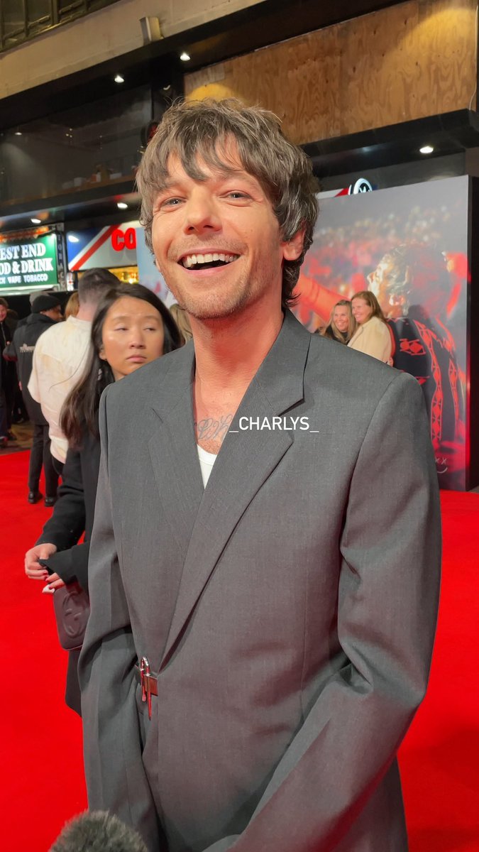 Smiley Louis at the premiere of #AllOfThoseVoices in London!