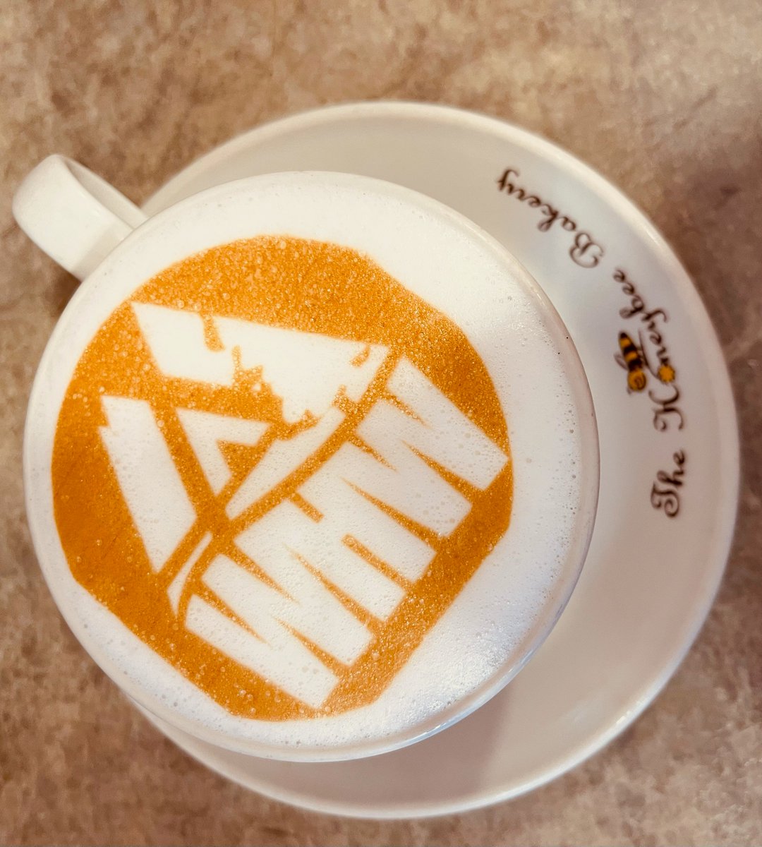 milngavie's tweet photo. Everyone walking @official_whw now has another 'must do' b4 starting. Take a #selfie with a #WestHighlandWay branded coffee from #HoneybeeBakery up steps from #Milngavie train station. Brownie points if you get the planter in the photo &amp; share on social. Supplier WHW passports. https://t.co/GzV0UbKF3q