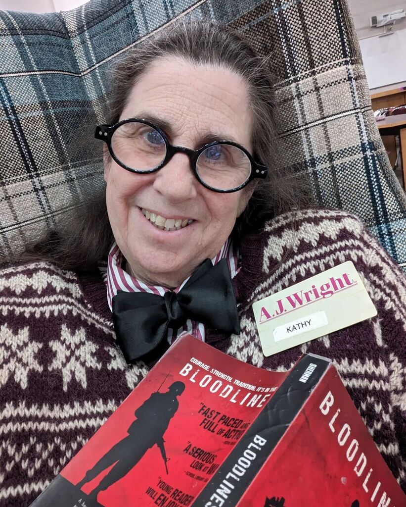 NHSSReads's tweet photo. This is the first time I have had more than a minute or two to sit in our new library furniture donated by Kronos. Parent/Teacher conference night. Reading a book to share with a class! #NHSSReads #NHSSlibrary https://t.co/EiMm6ERu63 https://t.co/bdtkwFoClw