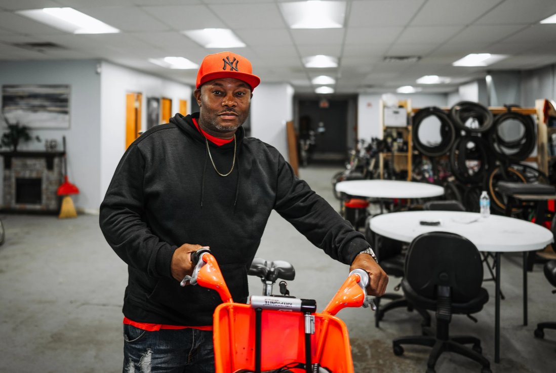 NYSERDA's tweet photo. Patrick Cray, a former #ClimateJustice #Fellow, has been helping pilot an E-Bike Library program in Buffalo supported by #CleanTransportationPrize winner @LISC_NYC. Through photography, Patrick shares the impact of this program on the community. https://t.co/4c8blTwMrJ https://t.co/WiDjL4u0pv