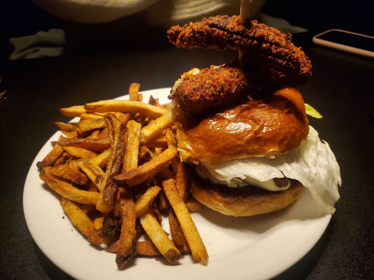 #yfcburgerbattle23 burg #13: the Mushroom Mozzarella Monster from Cannon's Cross Pub. An unfortunate amount of iceberg lettuce hides the glory beneath of a mound of sauteed mushrooms and tons mozza cheese. The spinach dip is a fantastic add, though I wish there was more of it