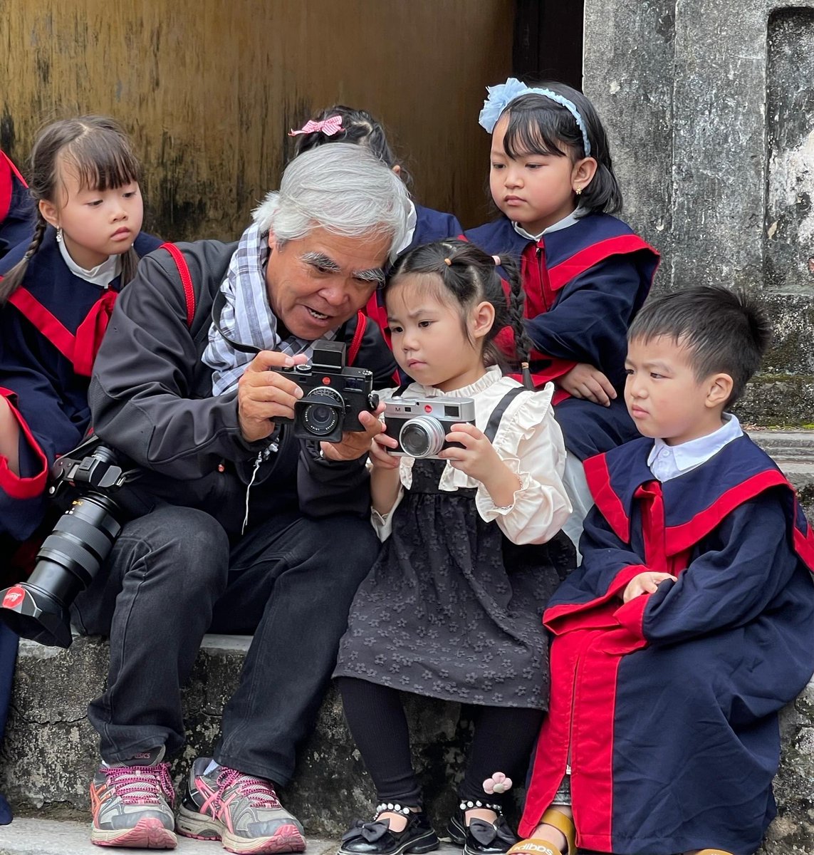 Nick teach school children’s how to use Leica camera and take picture in Hung Yen Vietnam.