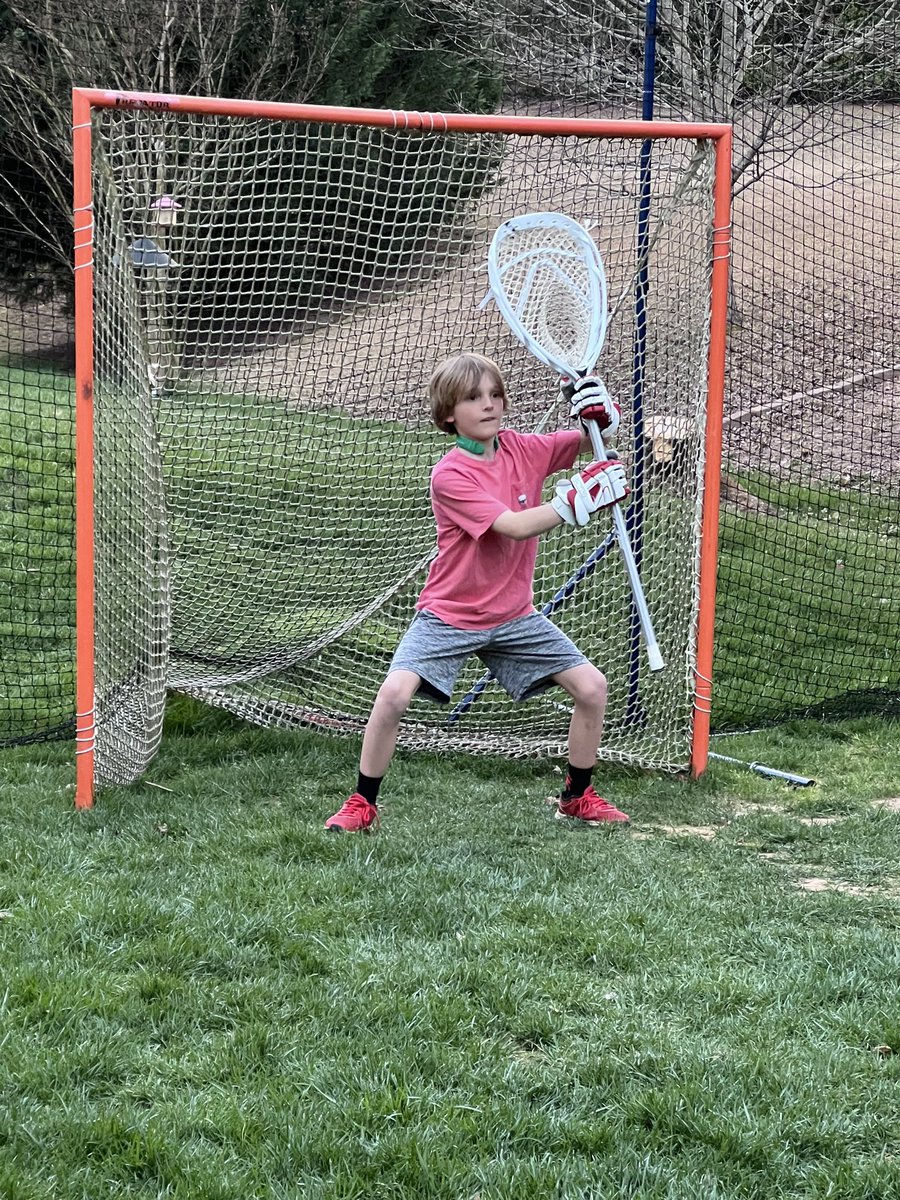 Getting used to our #QCollar while throwing in the backyard. @QCollarOfficial since Ethan has already had a concussion, it was time for some added protection