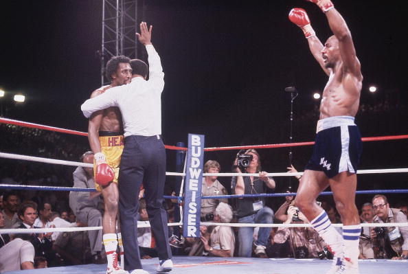 BoxingHistory's tweet photo. Marvelous Marvin Hagler raises his arms after stopping Thomas Hearns in 3 hellish rounds during their 1985 brawl for the middleweight championship.

(📸 Manny Millan) https://t.co/Ym3DeCbyJa