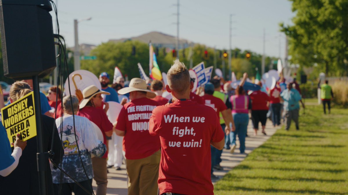xjoshbaileyx's tweet photo. Some screen grabs from footage I got today at the "Rally for a Raise" demonstration. These are cast members fighting for a living wage. Huge respect to all of them and @MaxwellFrostFL for showing support. Video coming in the future for @WhiteLakeFilms https://t.co/58QMSWqqls