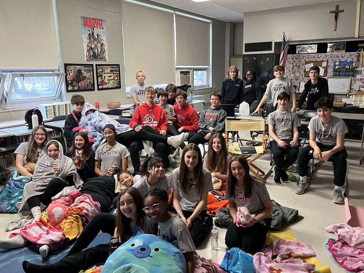 There's no better way to spend a rainy day than cozied up with your favorite blanket and Falcons! 7th graders enjoyed a movie afternoon for winning the door decorating contest during Catholic Schools Week. Ratatouille for the win!