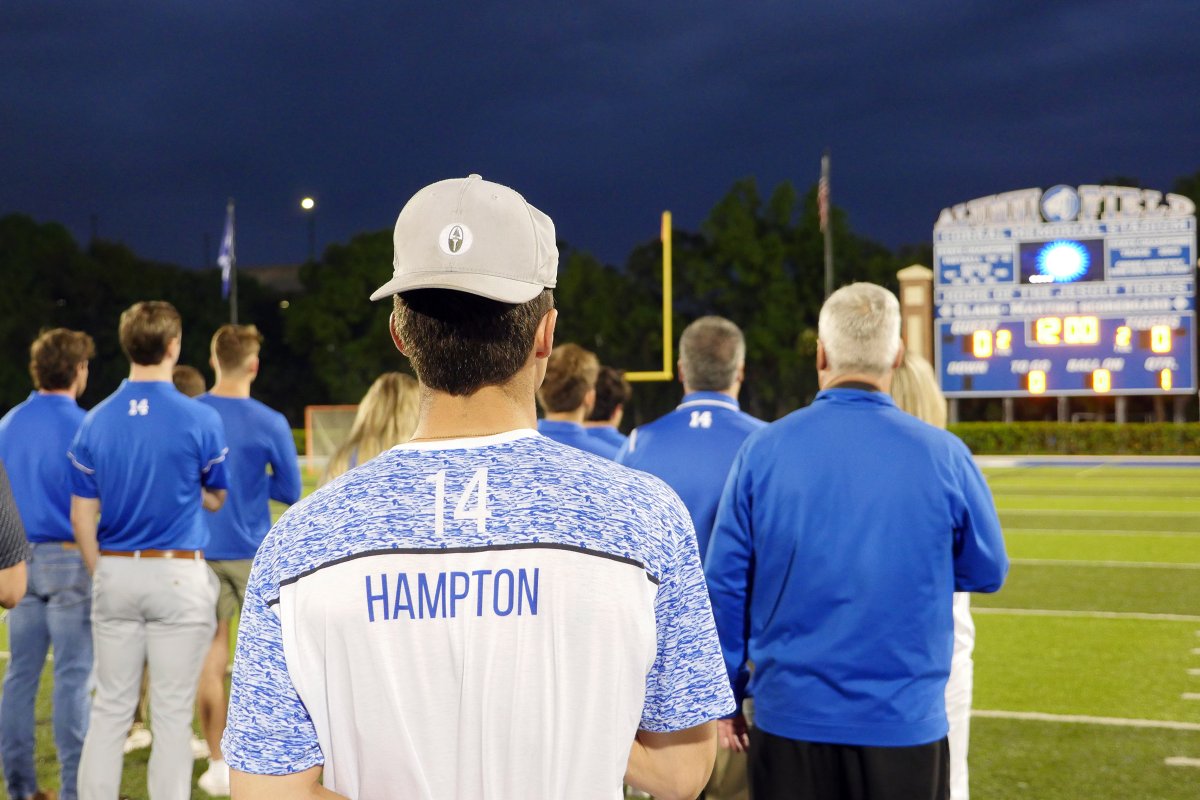 TampaJesuit's tweet photo. Jesuit lacrosse recently celebrated former player Cade Hampton, who died in a boating accident in 2020. Family, friends, teammates, teachers, and classmates attended the beautiful ceremony, during which Cade's No. 14 Jesuit lacrosse jersey was retired.

#AMDG #MenforOthers https://t.co/2vSd6IMrfK