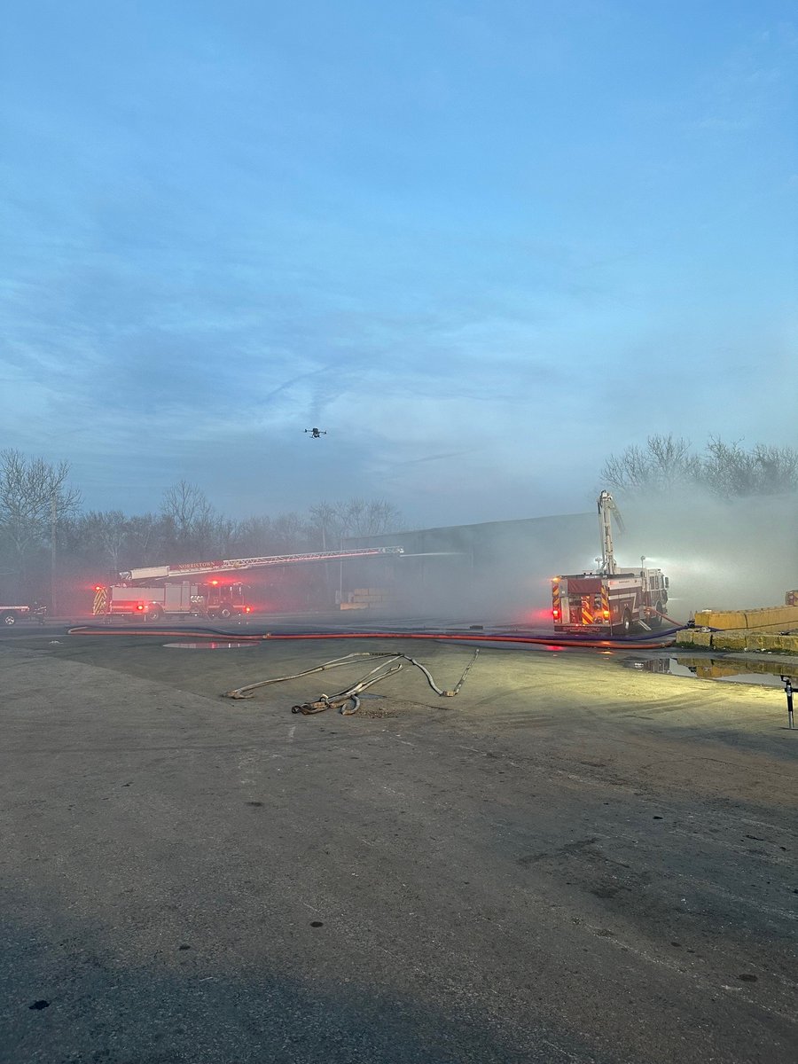 MCpublicsafety's tweet photo. On Wed, our UAV Team assisted Upper Merion Twp Fire &amp; EMS + @Swedesburgfc49 w/ a building fire on River Rd. Drones were used to direct hose streams &amp; to help the equip operator move piles of debris. Live video was streamed to the command post to inform tactical decision-making. https://t.co/DnbUUjedjS