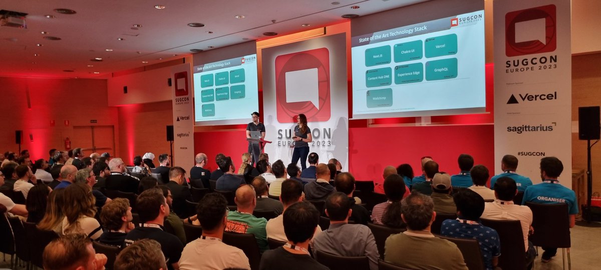 lovesitecore's tweet photo. @katho2404 and @Hahn1Christian showing the new #SUGDE website based on #Sitecore #ContentHubONE at #SUGCON in a packed room https://t.co/73ECTQ0pPE