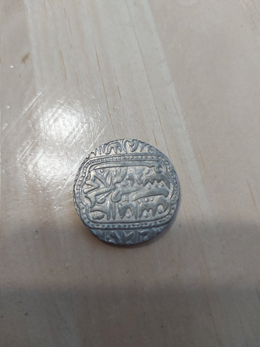 McCormark's tweet image. A silver Akbar temple token from 19th century India. It's hard to determine its exact age because it doesn't have a mint date. The design imitates Mughal Empire gold coins from 1574 to 1576.

Also, no coin stream tonight but I will be playing Spyro 2!