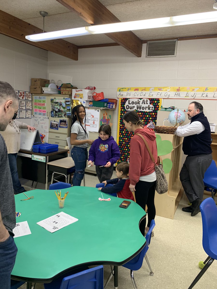 TeachJenFischer's tweet photo. Student Council sponsored a Family Reading Night. Great literature and fun was enjoyed by all! #FTSFireballs https://t.co/0P9MTQ1gxH
