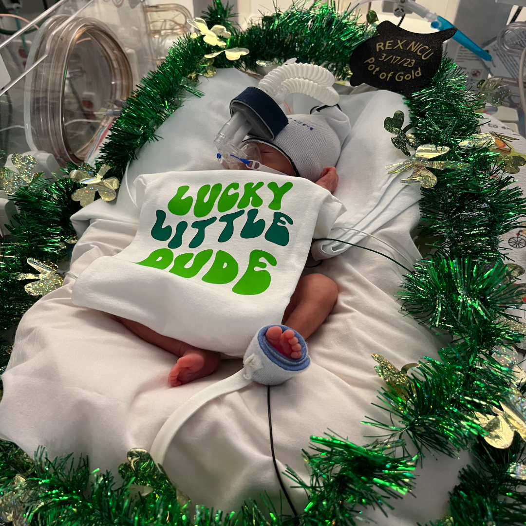 UNCHealthRexHS's tweet photo. Babies at the UNC Health Rex Women's Center NICU in Raleigh are dressed up for St. Patrick's Day today! The onesies our beautiful babies are sporting were made by a Rex NICU teammate. Take a look at these beautiful faces! ππ
#rex #rexrocks #rexbaby #stpatricksday #paddysday https://t.co/3QGzqIjSAZ