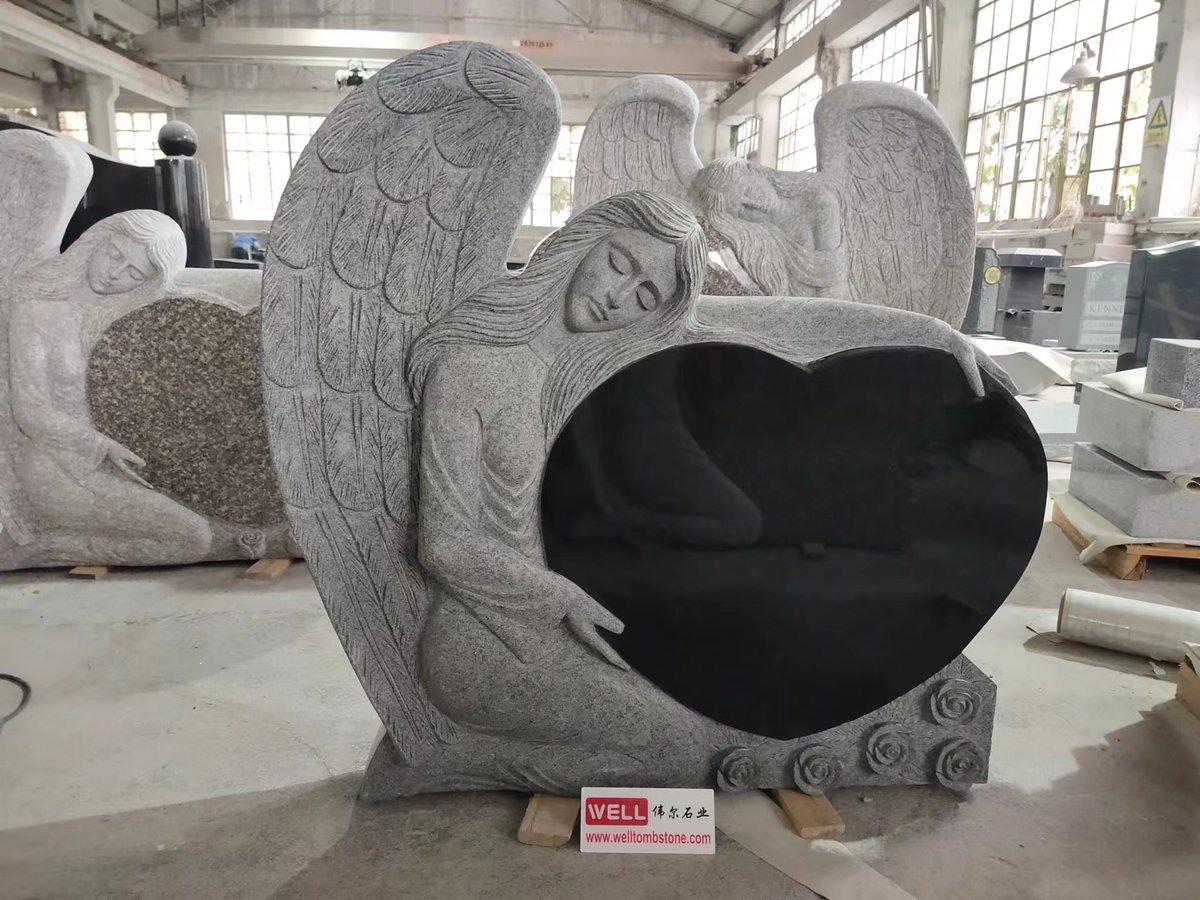 sam168stone's tweet image. granite angel head stone with heart