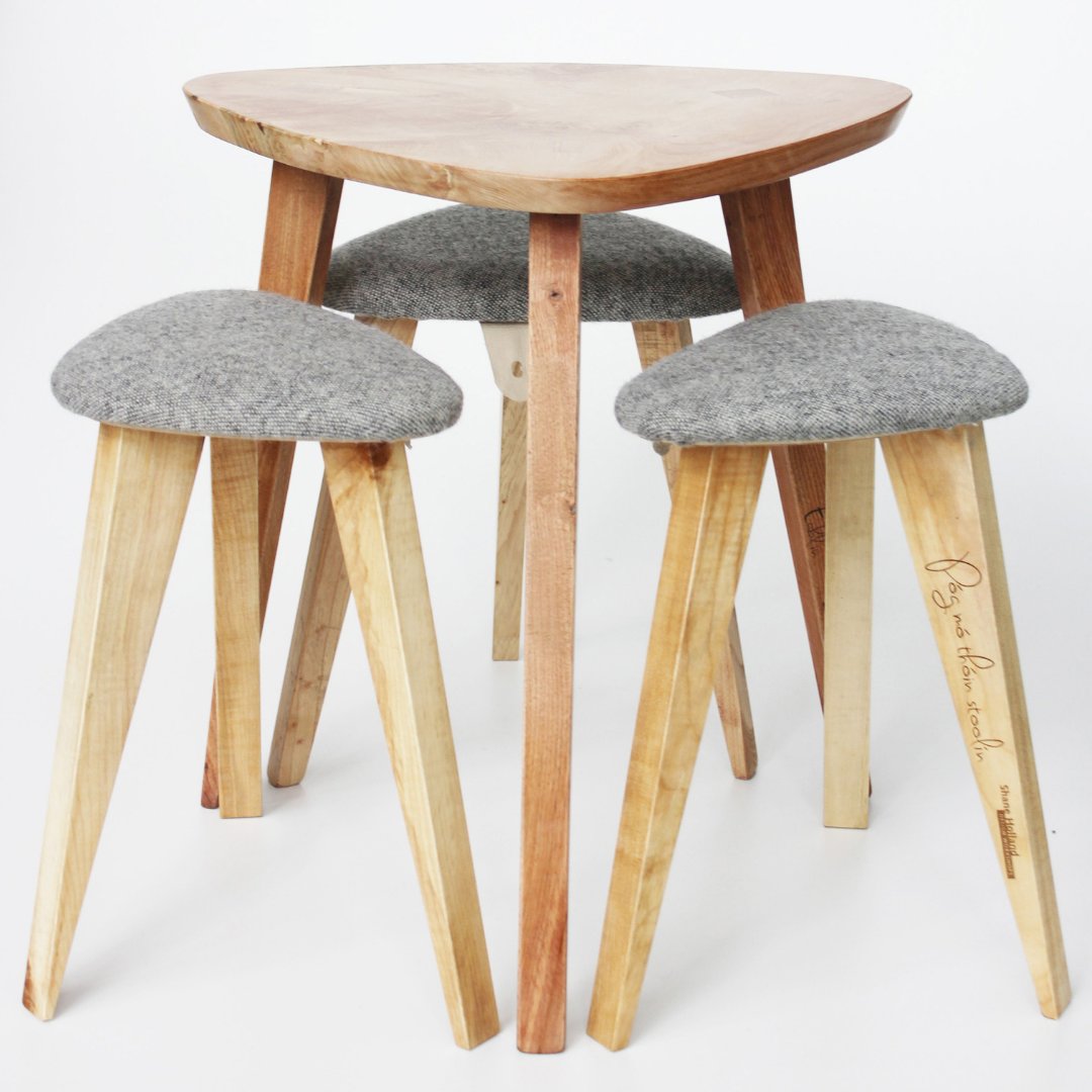 ShaneHollandDW's tweet photo. The 'Póg mó Thóin Stoolín' is a redesign of a  traditional Irish milking stool. It easy to store away, perfect for extra seating for #stpatricksday  #celebrations.  Lá Fheile Pádraig sona duit.
 #traditionalfurniture #milkingstool #stool #woodenstool #woodentable  #designermaker https://t.co/2AhwwCmH47