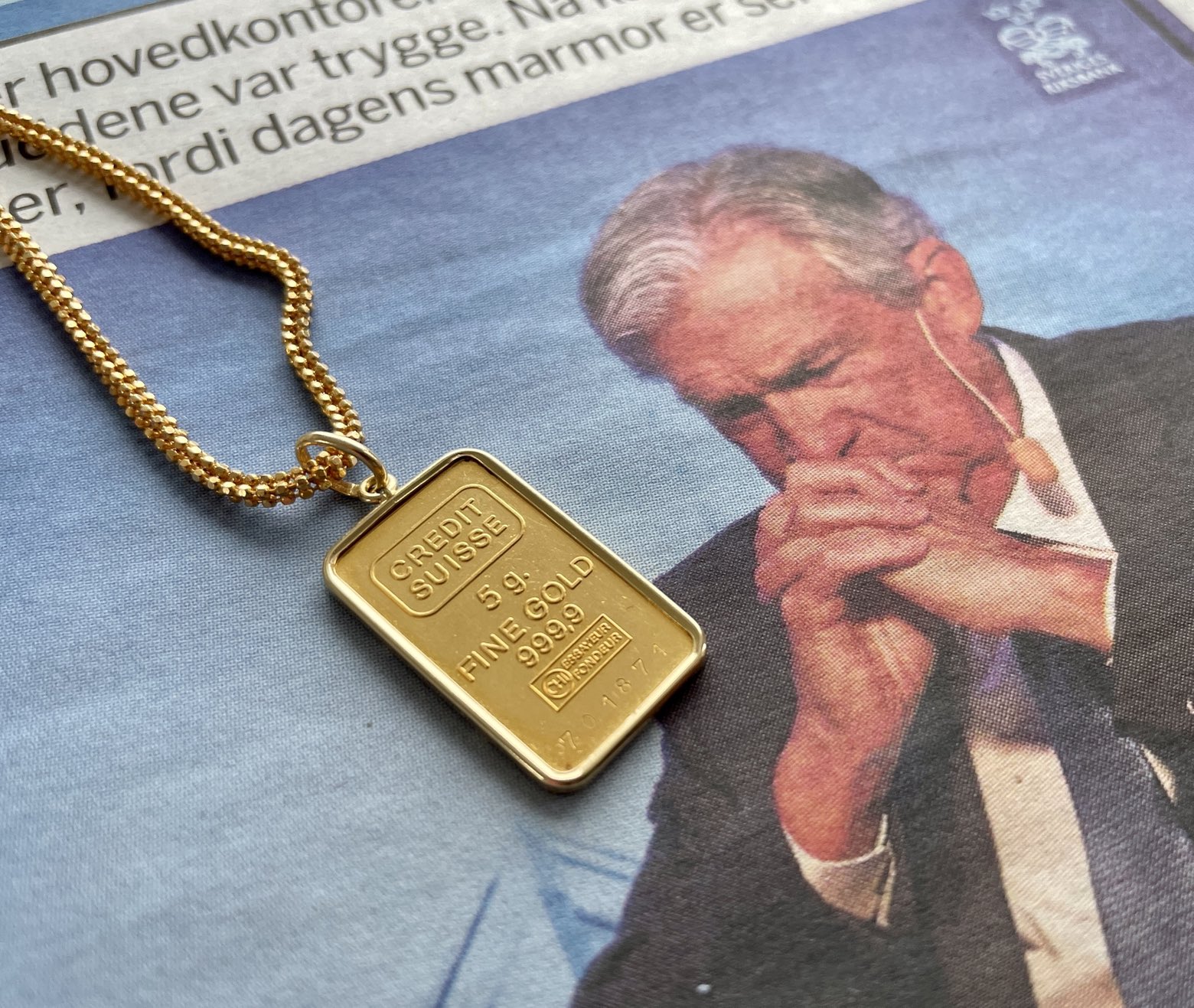 Credit suisse store gold pendant