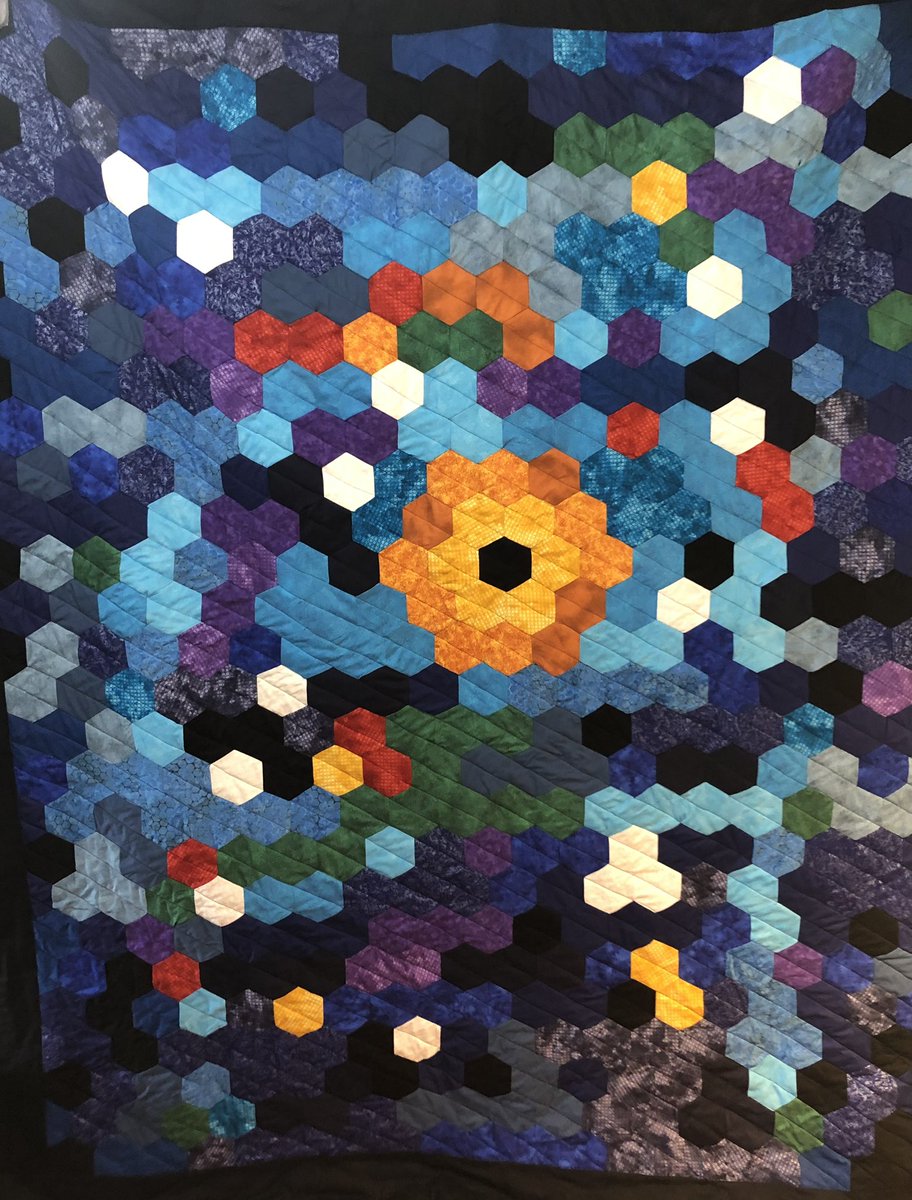 ElynArscott's tweet photo. Hey @NASA, my mom made this quilt inspired by the @NASAWebb telescope. Using the hexagonal shape of the mirrors &amp; stunning colour contained in the images, it was her way of expressing the cutting edge of science with traditional craftsmanship and sewing techniques! https://t.co/kQyokwzl1q