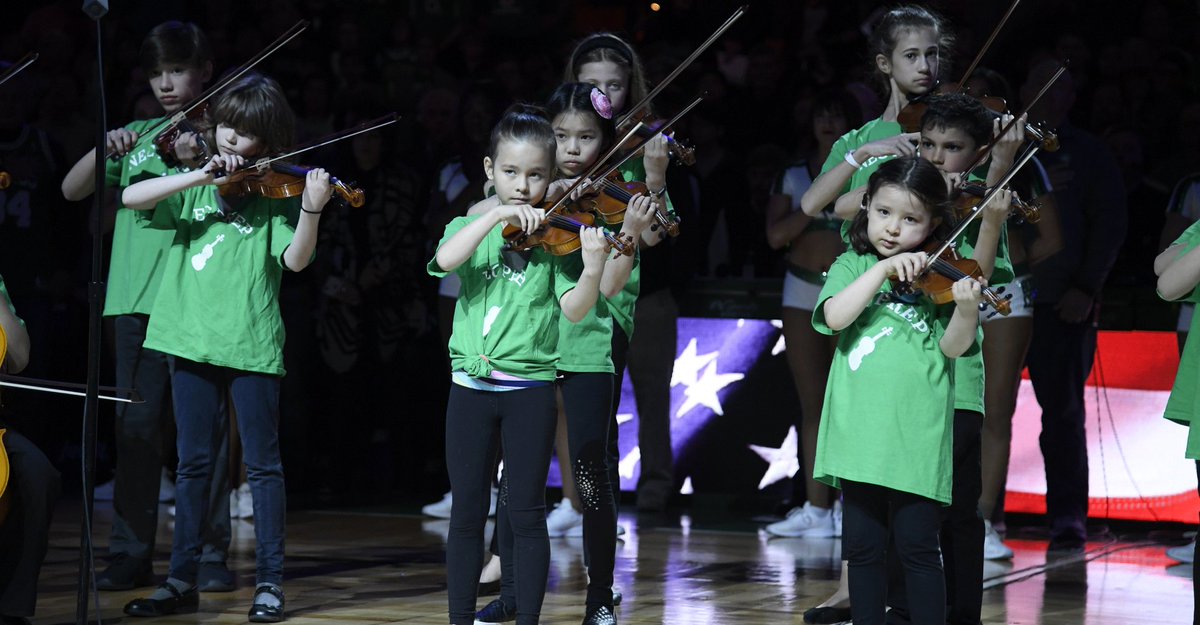 Flashback to the incredible performance by NEC's youngest musicians performing the National Anthem before a Celtics game in 2019! 🎶🏀 

We're feeling nostalgic for this unforgettable moment and can't wait to relive it next Friday when 42 students return to the court! 🍀