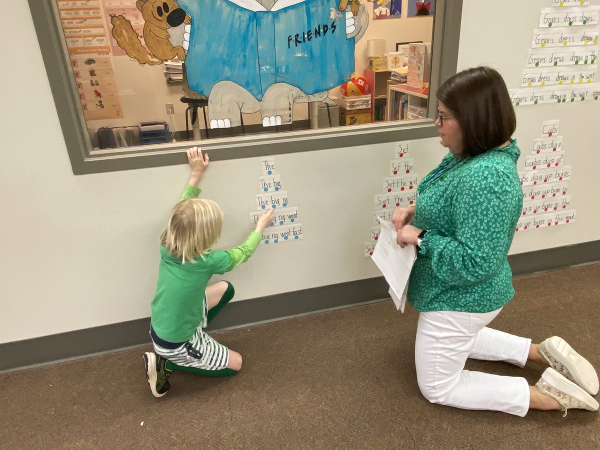 A K student practices fluency by building and reading fluency pyramids!      #trinitylearns Miss Perry!