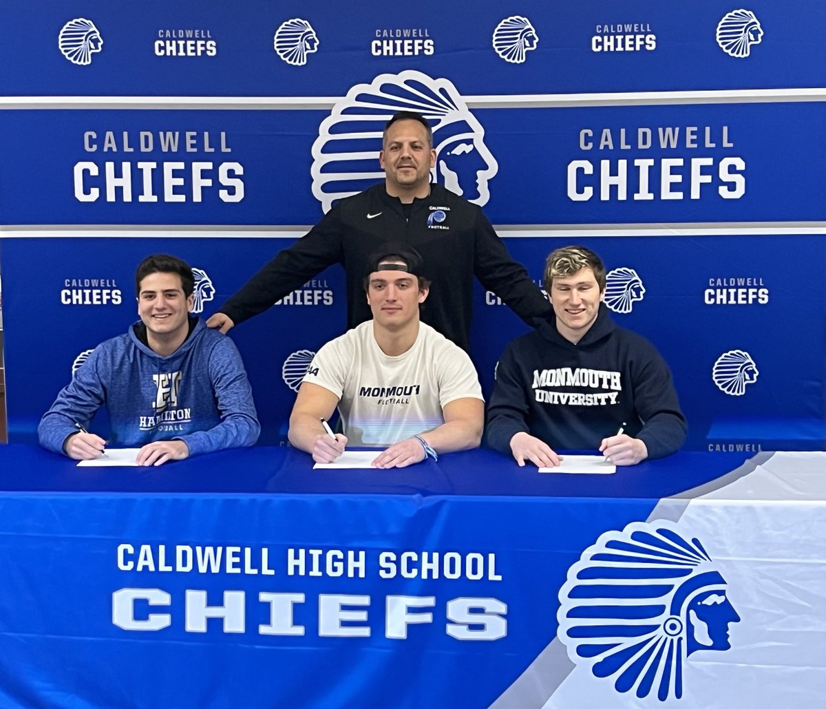 Three of our very best as they officially commit to play football at the next level. Proud Head Coach Todd Romano poses with Luke Kurzum(Hamilton College), Thomas Cader &amp; Harry Boland(both Monmouth University). What a group!