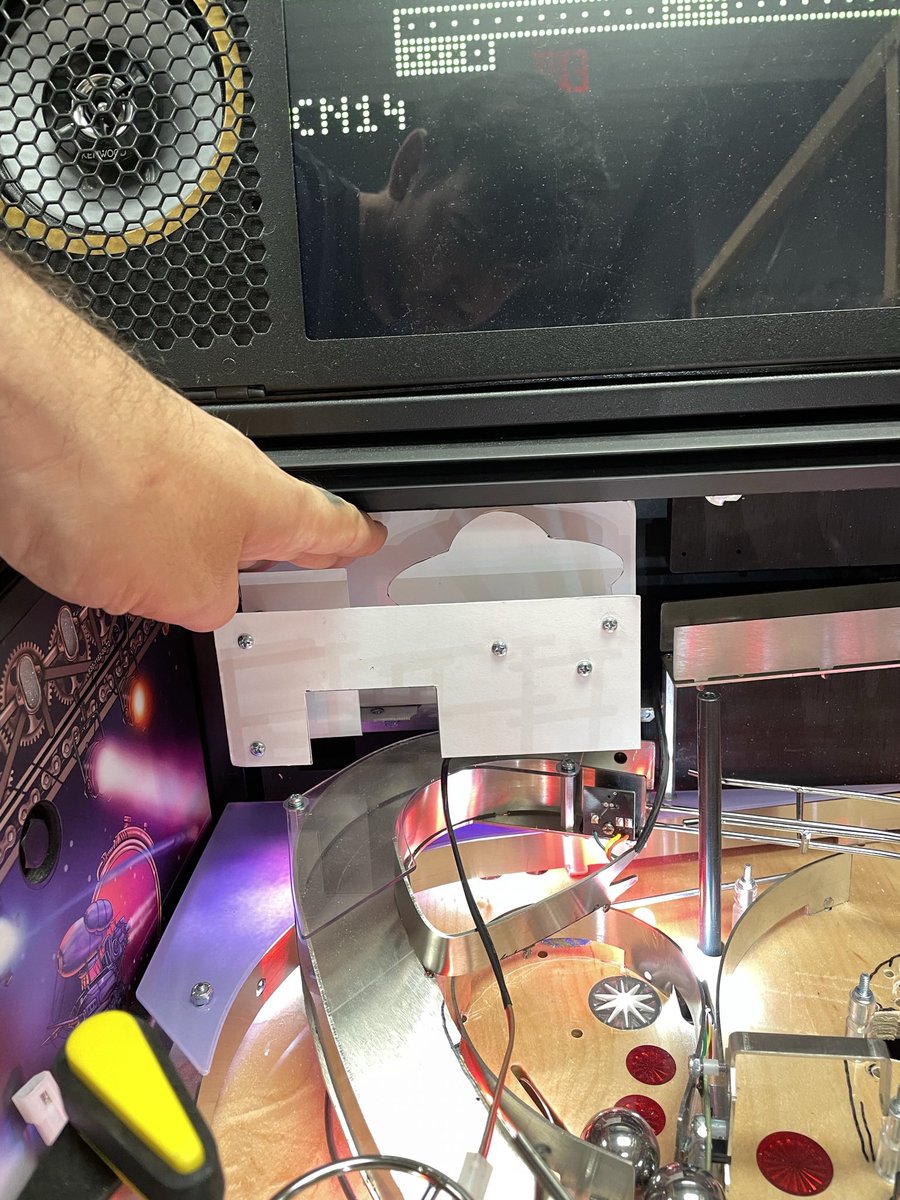 DeadFlip's tweet photo. Dreaming up the “Area 51” for the pro model of Foo Fighters #pinball.

I knew I wanted to fill this space in, since we didn’t have the upper playfield, but I wanted something more than just a flat plastic.

A stack of plastics that the ball could go THROUGH was the goal, to give the feel of coming through the doors of Area 51.

Mix that with awesome @zombieyeti art, and you get this bad boy! ❤️