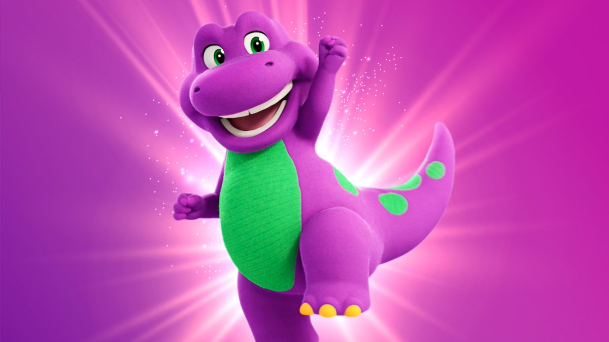 B985FM's tweet photo. I should have known that when you wear green for #StPatricksDay, then you put on your raincoat (that happens to be purple) because it’s raining, you will bear a striking resemblance to a high profile celebrity… 🍀😂🦖 -@abbyjessen #Barney #OutfitFail https://t.co/D4zZ9kBhFa