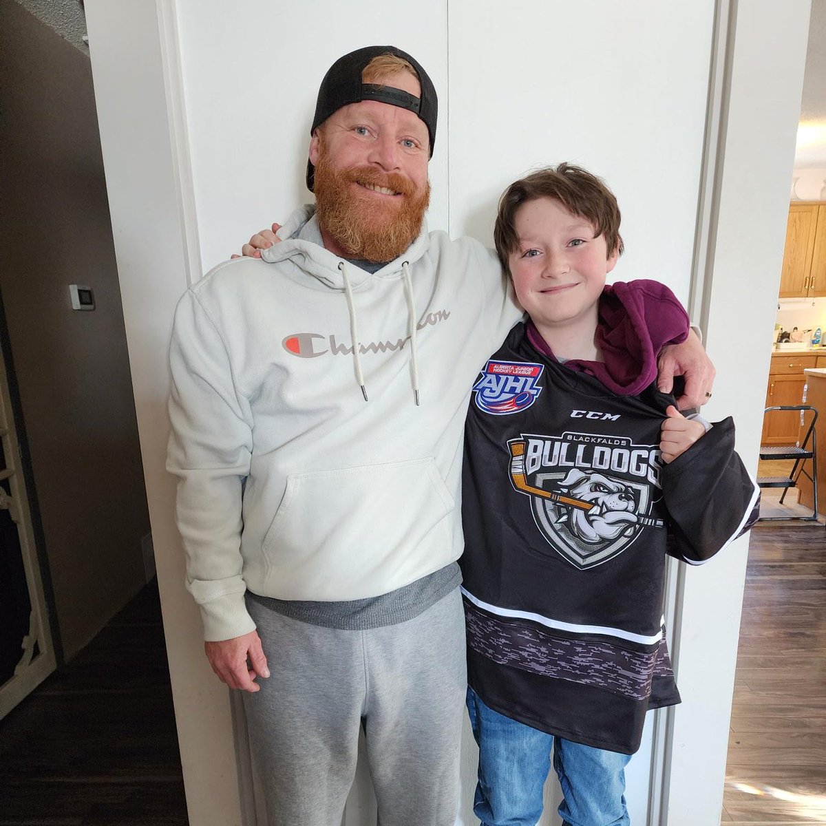 Our Eagle Builders night jersey winning champion was David Kirkby, pictured with foreman super dad, Ken Kirkby! 

David looks awesome in his @AJHLBulldogs threads, and fun fact - David's awesome mom, Jenise, is an integral part of Aggregate Design Studio!