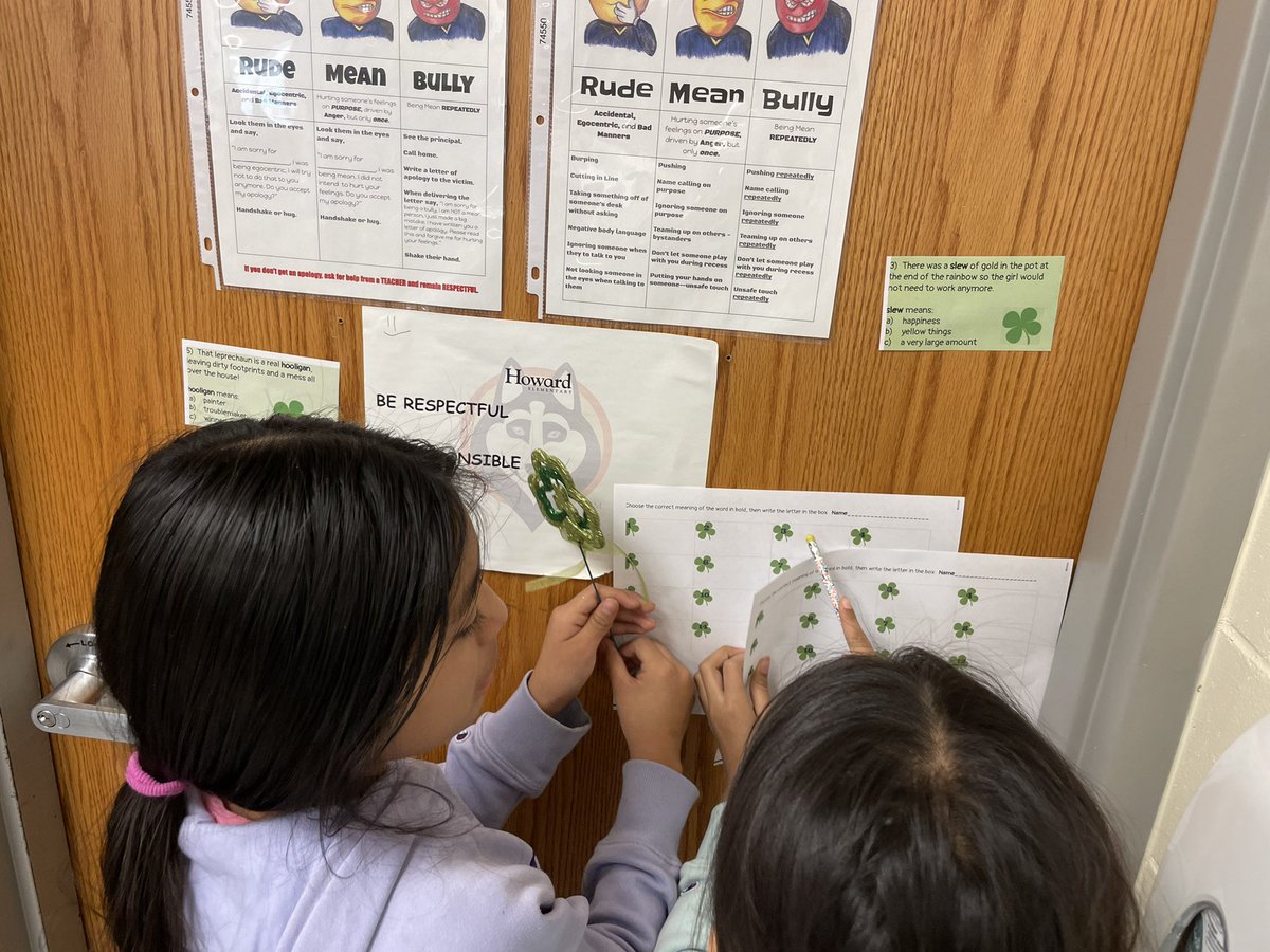 patsyacorn's tweet photo. Happy St Patrick Day!Students answer vocabulary questions posted around the room. @HowardGI https://t.co/LKdBvxNKJY