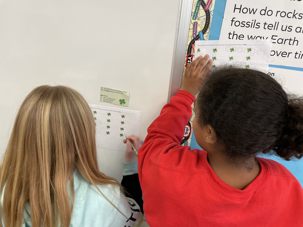 patsyacorn's tweet photo. Happy St Patrick Day!Students answer vocabulary questions posted around the room. @HowardGI https://t.co/LKdBvxNKJY