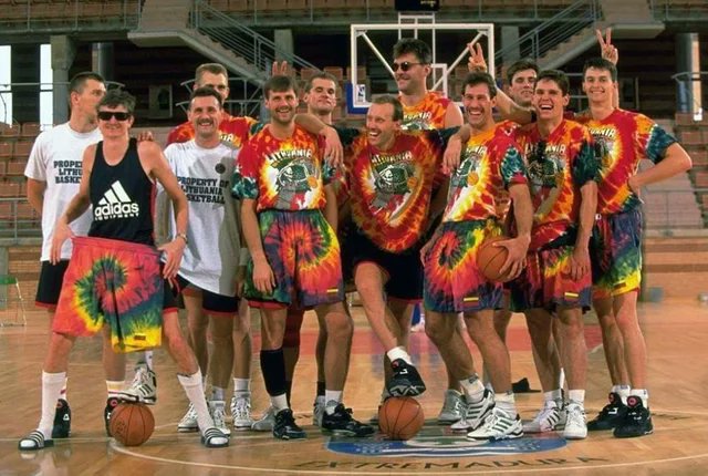 historydefined's tweet image. The Lithuanian national basketball team poses for a photo during the 1992 Olympics in Barcelona. After leaving the USSR, they relied on outside funding, including a sponsorship from the Grateful Dead.