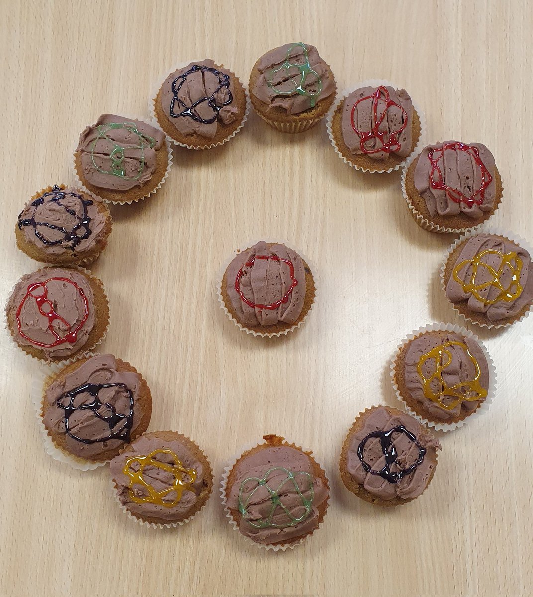 Some splendid knot theory coffee cup cakes from Tatiana today @solsch1560 Maths Cake Club. #SolSchMaths