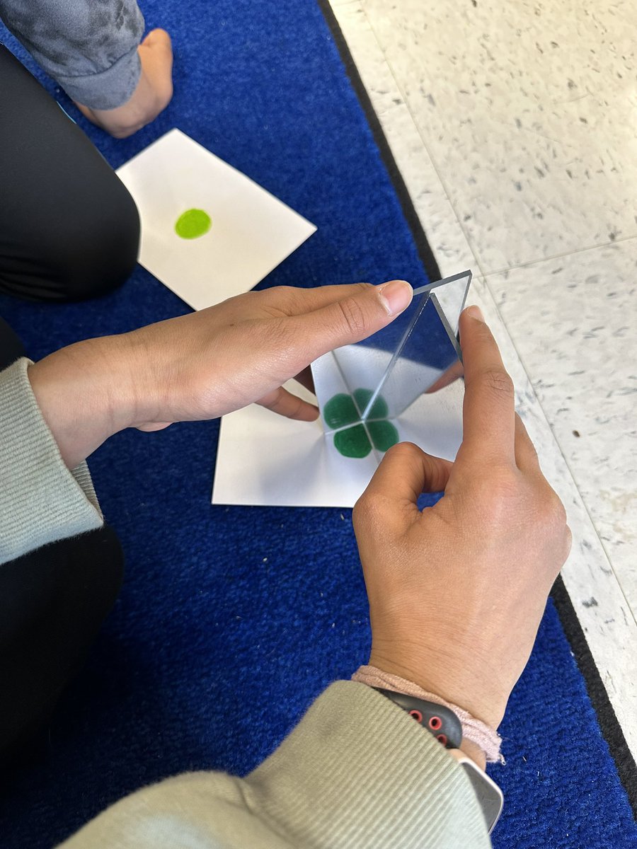 MsRegula5's tweet photo. To celebrate St. Patrick’s Day, we demonstrated our understanding of our science unit (Light) by making shamrock and rainbow reflections! https://t.co/vLiiywiC9s