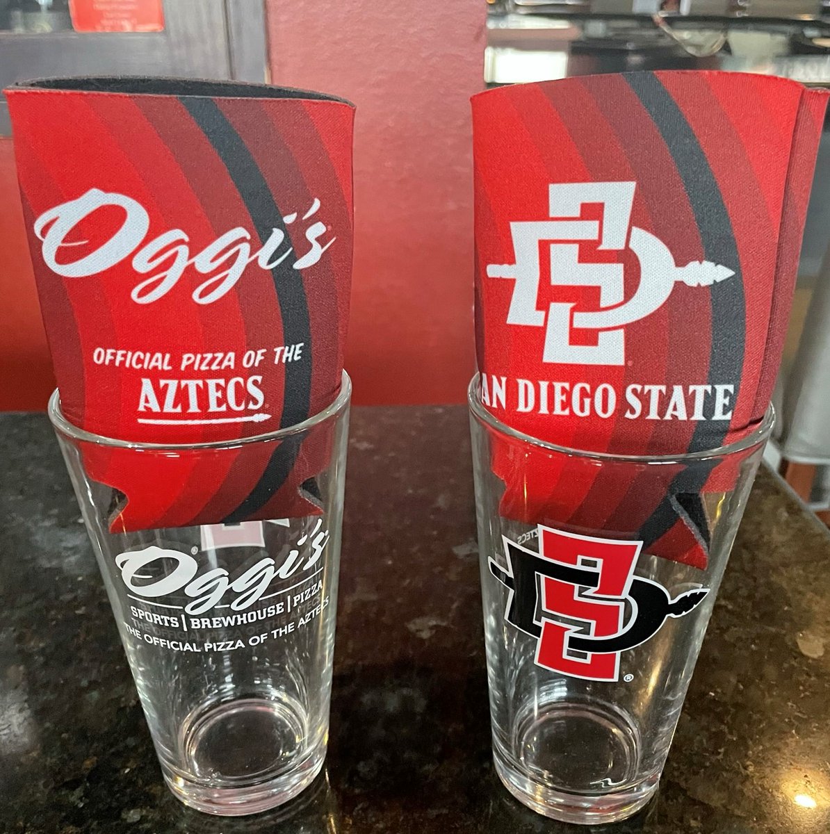#OggisDelMar OPENS EARLY, SAT 3/18, 9:00AM for the 9:10 #SanDiegoStateAztec #MarchMania #Basketball game vs #NorthGreenvillePaladins

FIRST 2 customers get 20% off dine in meal.  
NEXT 10 customers get #Aztec PINT GLASS &amp; KOOZIE.

Also, enter to win a custom Oggi's Party Chair!