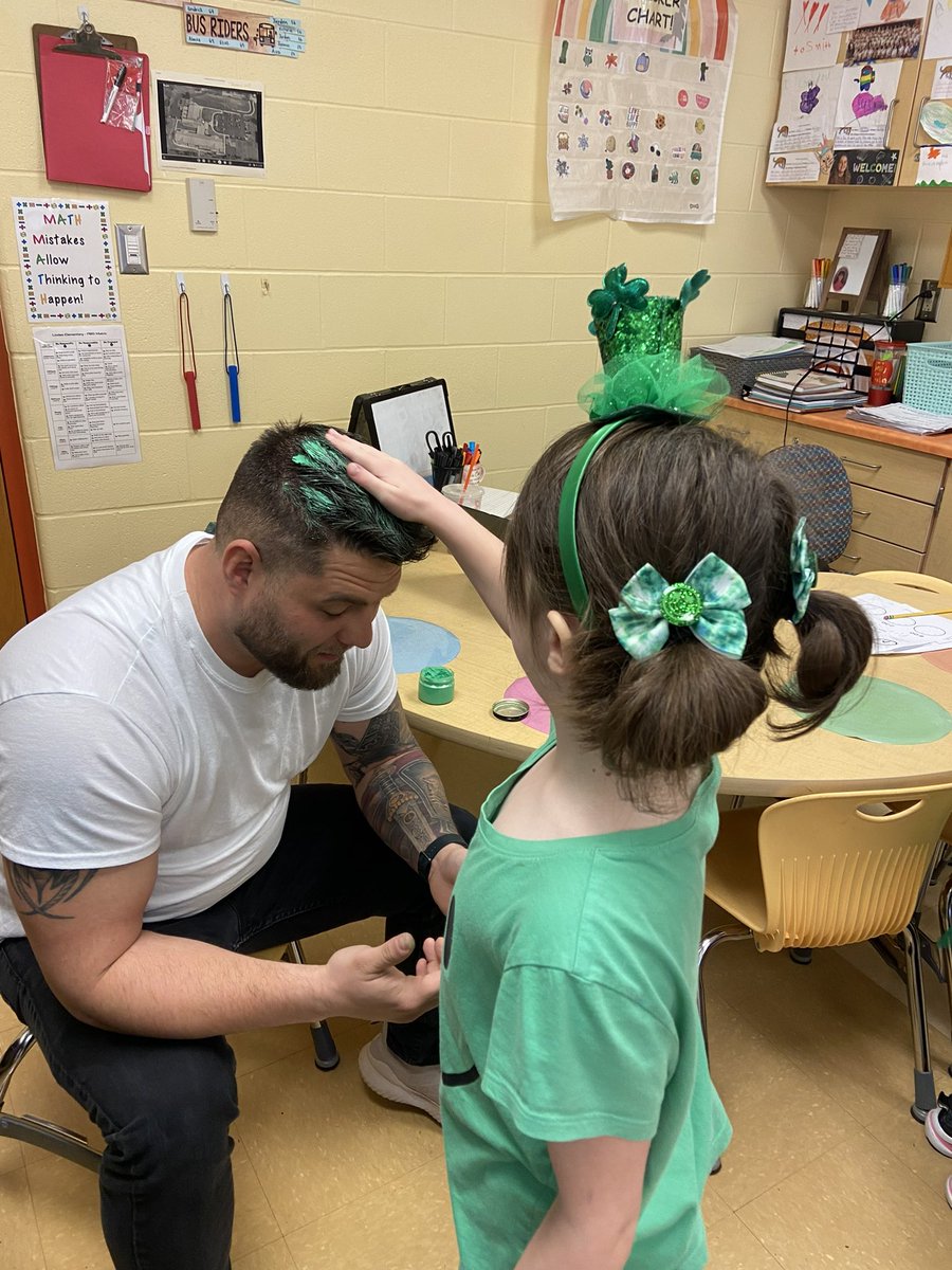 MrsMcIntyreED's tweet photo. Shoutout to Mr. Brown for being the best sport! Our students wrote a persuasive letter to him with some pretty convincing reasons that he should dye his hair blue. Today he compromised and let them dye his hair green for St. Patrick’s day! 🍀@Hamilton_LN #OneLinden https://t.co/nNRDciTSO9