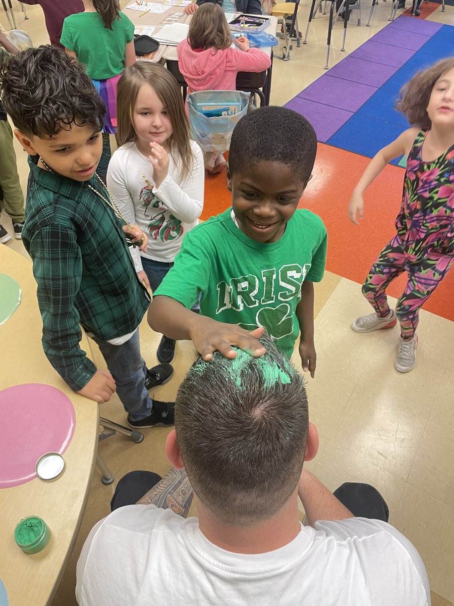 MrsMcIntyreED's tweet photo. Shoutout to Mr. Brown for being the best sport! Our students wrote a persuasive letter to him with some pretty convincing reasons that he should dye his hair blue. Today he compromised and let them dye his hair green for St. Patrick’s day! 🍀@Hamilton_LN #OneLinden https://t.co/nNRDciTSO9